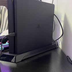 Sony PlayStation 4 Slim Console 1-TB Hard Drive Like New, Perfect Condition, Used A Few Times, No Dent Or Scratches, Stand Included.