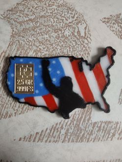 2.5 g silver bar with commemerative defiant fist trump American flag