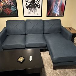 Teal L shaped reversable sofa