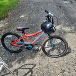 Young Boys Bike And Helmet