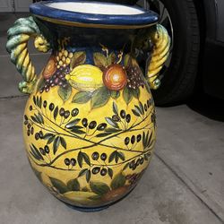 hand-painted Italian-style decorative ceramic pieces — a large urn/vase and two matching bowls with a fruit & olive motif (Tuscan/Mediterranean style)