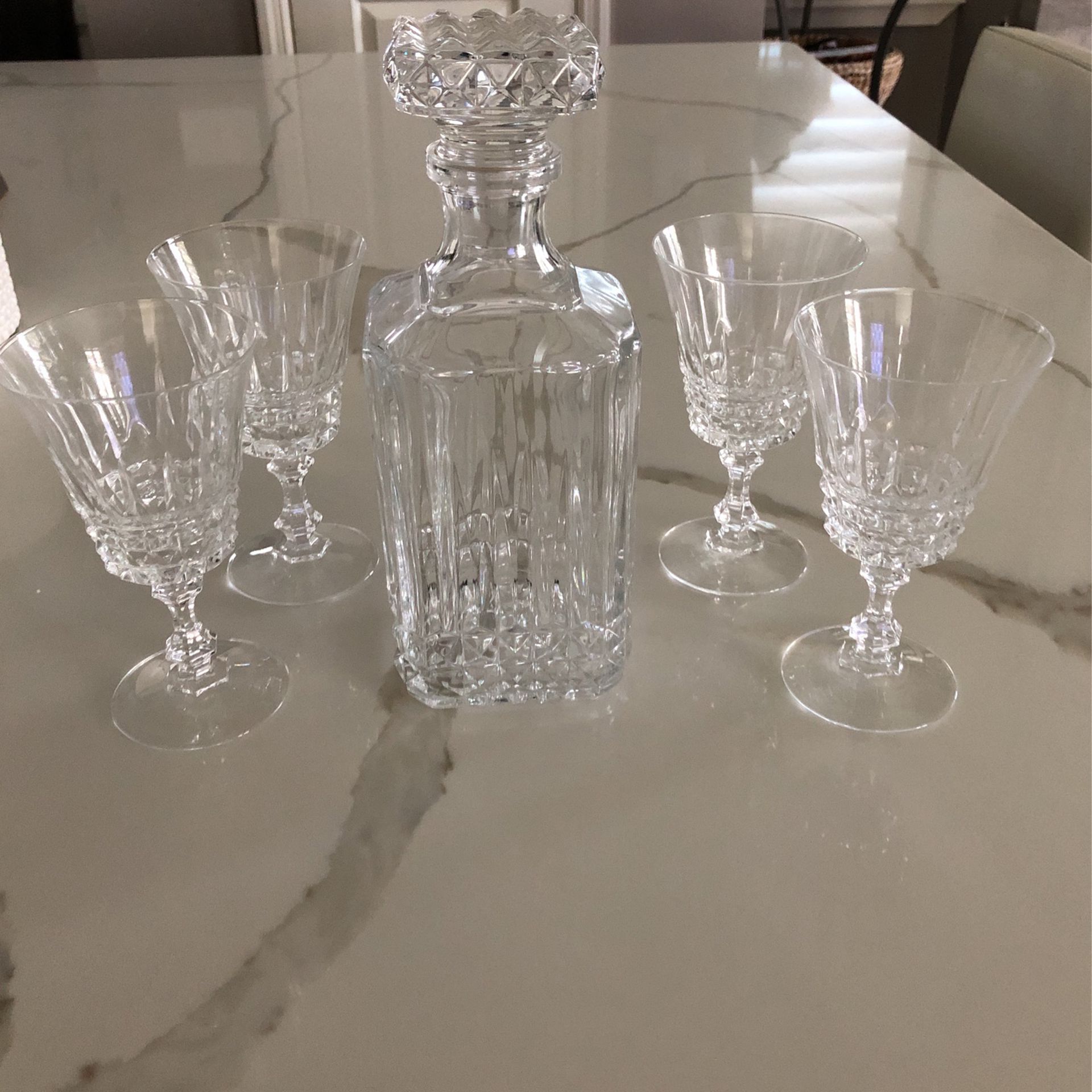 Decanter And Four Crystal Glasses