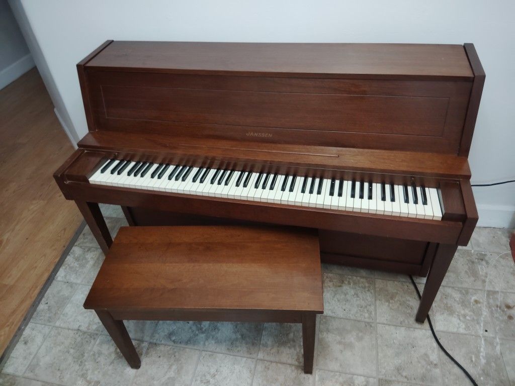 JENSSEN UPRIGHT PIANO IN GOOD CONDITION