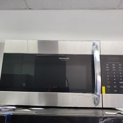 microwave open box warranty great condition  GE or frigidaire...225