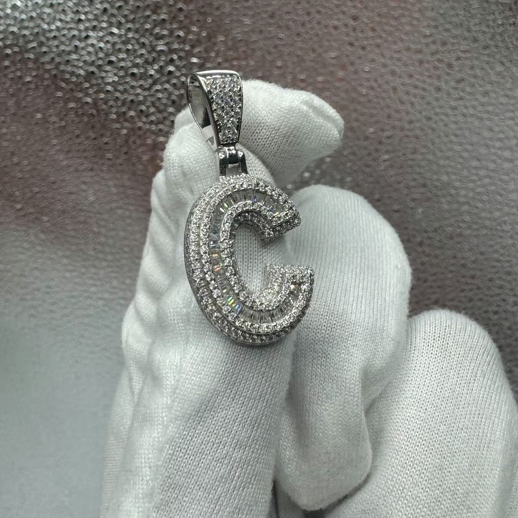 A Moissanite Initial in Sterling Silver with a CTW of 2.74 in Bugget Style