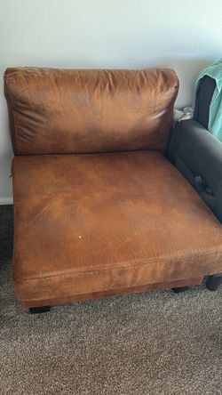 Tan color single seat sofa