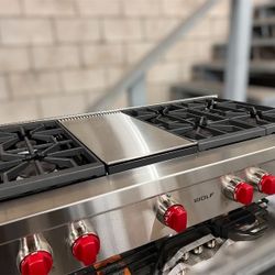 Wolf SRT486GLP
48 Inch Pro-Style Gas Rangetop with 6 Dual-Stacked Sealed Burners, Porcelain-Coated Cast Iron Continuous Grates, Infrared Griddle, Simm