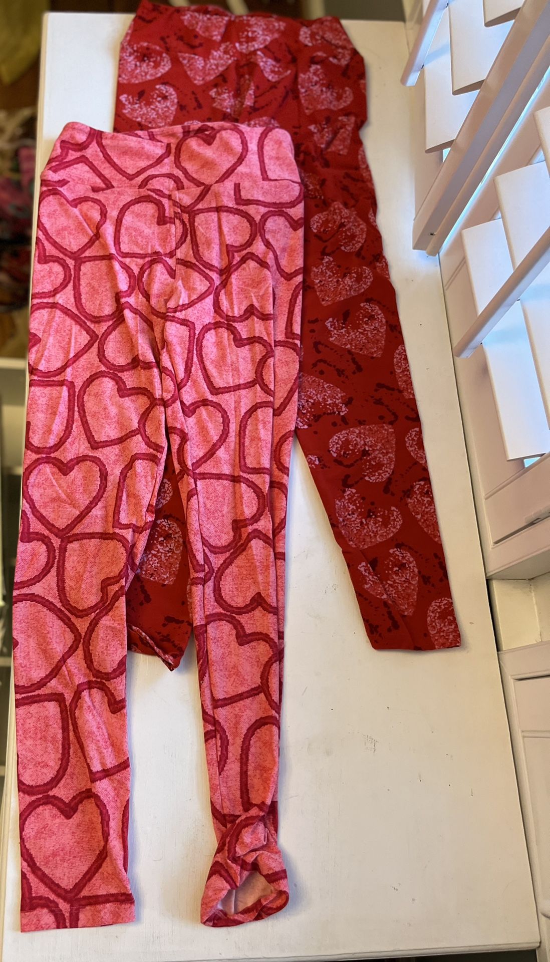 Valentines gifts! NEW Lu la roe heart leggings. Never worn one size. Buttery soft $25 each Red xs Old navy shirt xs $5 Victoria secret purse clutch