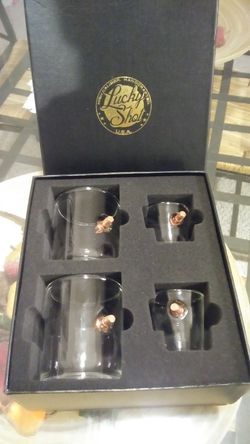 Whiskey and shot .308 bullet glass