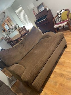 Brown love seat