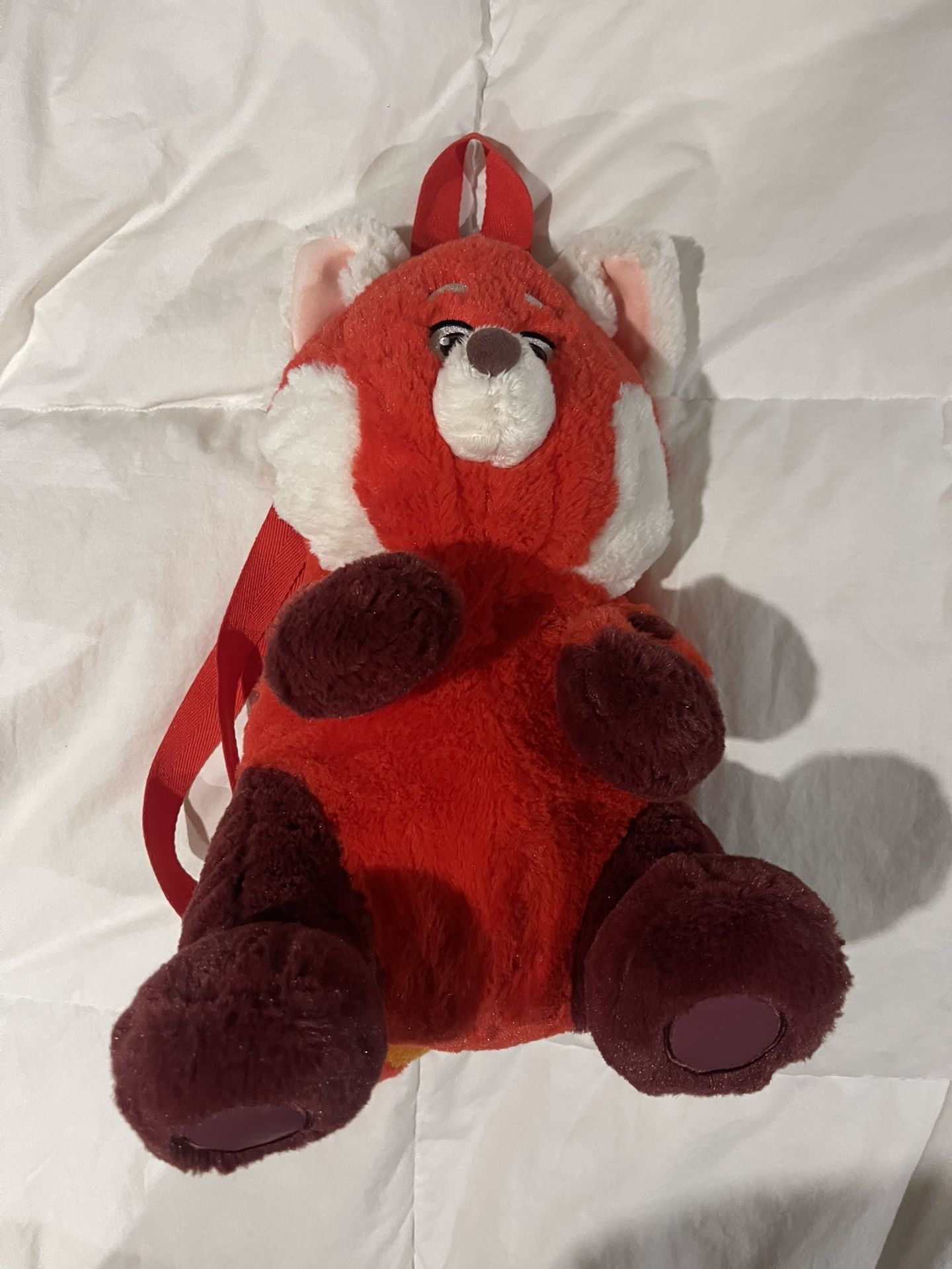 Plush character backpack of Mei Lee's red panda