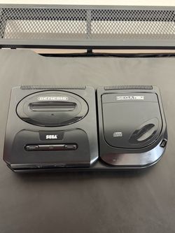 Sega and Sega cd. Sega works. Cd spins but doesn’t load. All cables included and game