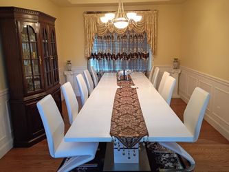 Modern White Dining Table with 10 Leatherette cantilever dining chairs