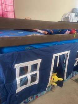 Kids bunk bed with clubhouse  bottom mattress not included  ,top mattress included