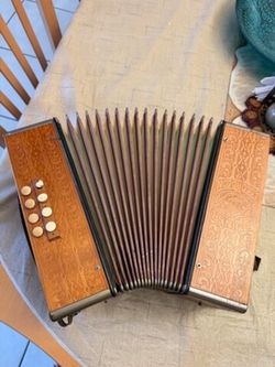 Vintage Hohner Marca  Wood Diatonic 29 Key Accordion likely from the 1930s (TRADE??) featuring a decorative anchor logo, light-colored round buttons, 