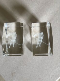 Glass hockey player paperweights