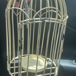 Brand new beautiful, metal decorative birdhouse to put a candle in, etc. absolutely gorgeous