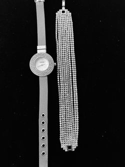 Silver wristwatch and bracelet
