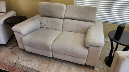 Beige reclining couch