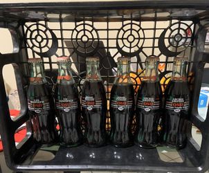 6 Collectible Coca Cola Bottles
