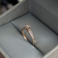 Gold Ring With Little Diamonds Around 