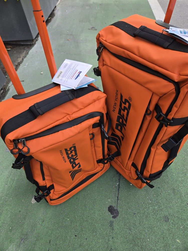 2 Pc. Set 20" Carry On And 26" Good For 50 Pounds Extra Lightweight Expandable Waterproof New With Tags Orange Color