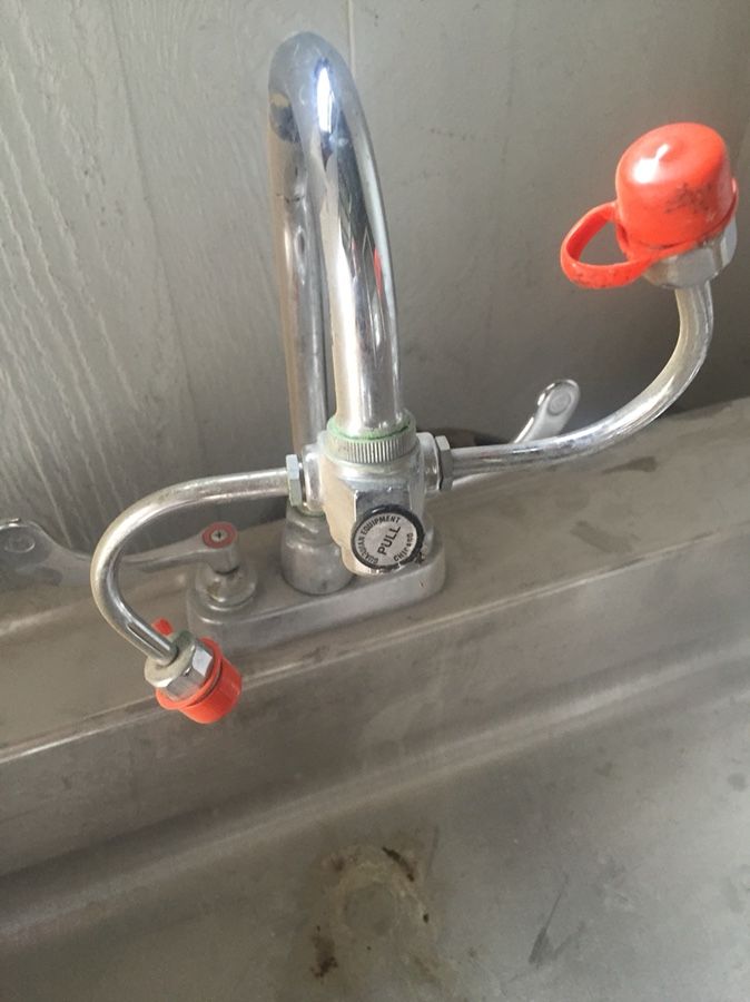 Sink with eye wash faucet
