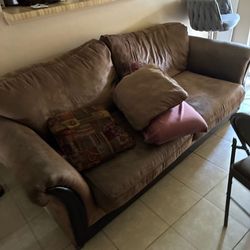 two couches clearly used.