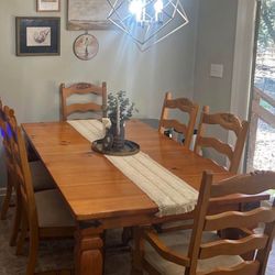 Dining table with 6 chairs and leaf