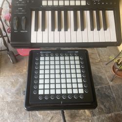 novation  key board and launch pad with stand