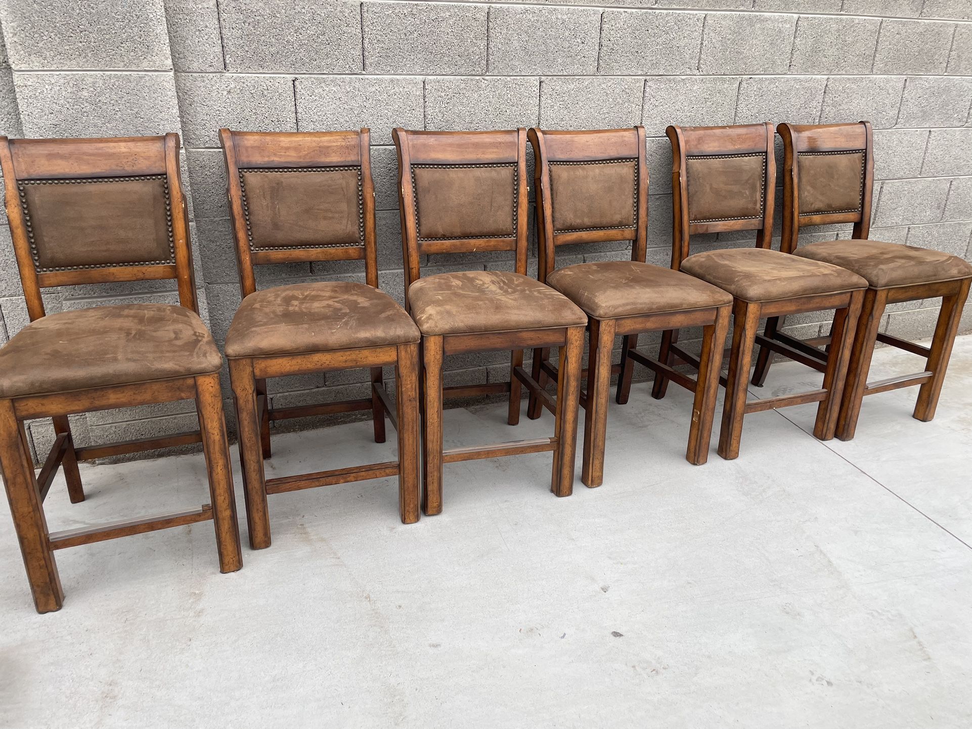 Six Tall Wooden Chairs