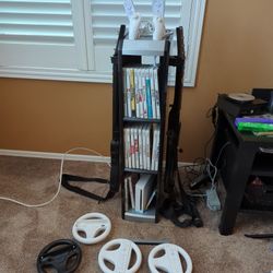 Original Nintendo Wii w/ accessories, games, and housing