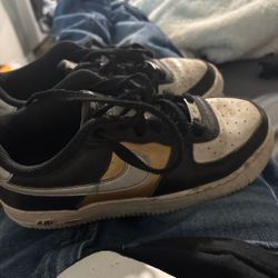 Nike black white gold and silver size is 5.5 Nike black white gold and silver size is 5.5