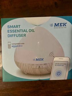 Smart essential oil diffuser  Compatible with Amazon Alexa  Can be controlled by mobile app (Few essential oil available for free) Brand new  Only pic