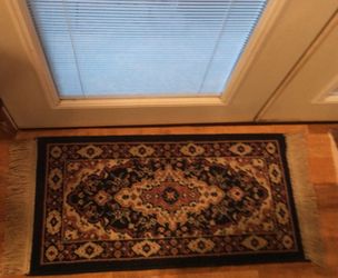 Oriental rug for door