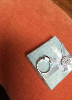 Silver stamped Ring has dark purple stone size 7