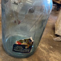 Vintage glass water jug with label