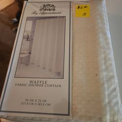 2 Shower Curtains. 1 New in Package & 1 Barely Used. $ 5 EACH