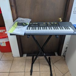 Like-New Casio CTK-2400 Musical Keyboard with Stand , Power and box