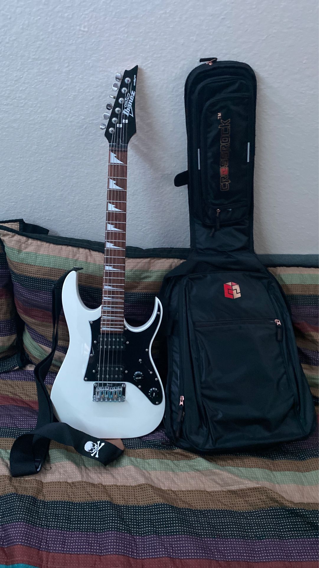 Ibanez mini size guitar with travel backpack strap case and strap