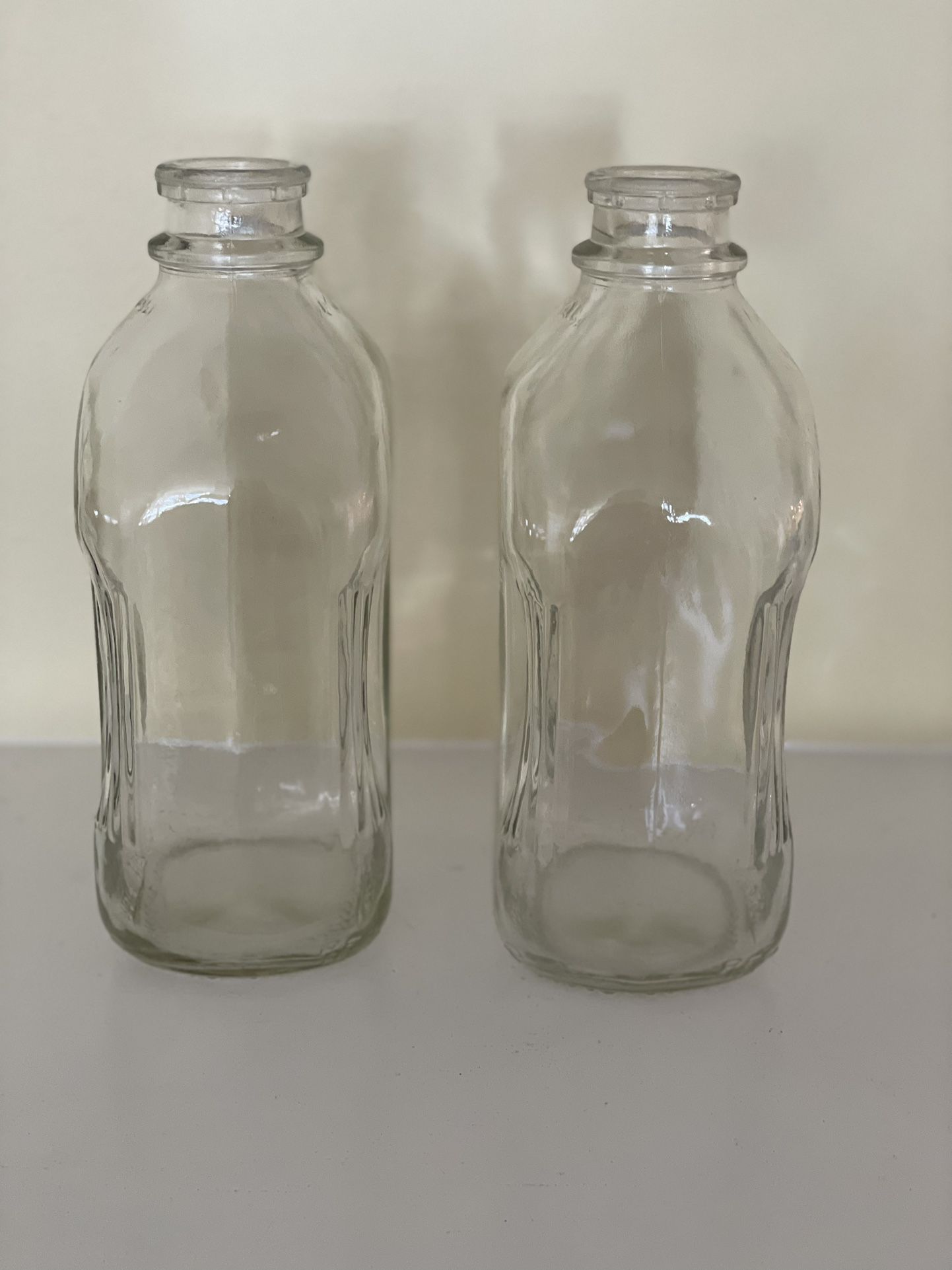 2 Vintage glass milk bottles