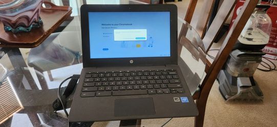 HP Chromebook with charger and case