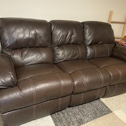 Leather Couch, 65 Inch Lg Smart Tv, Subwoofer And Sound Bar, Entertainment Center