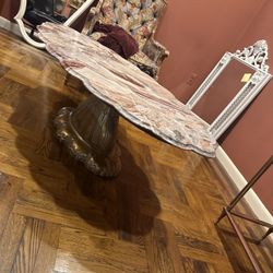 Marble top scalloped antique coffee table  Excellent Condition  This is a large, live-edge pink onyx or  marble coffee table with a gold-toned,  ornat