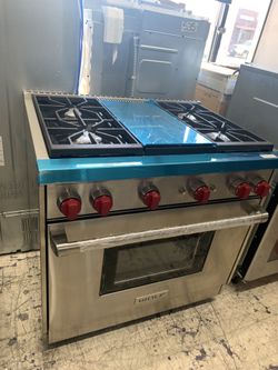 Wolf 36” slide in range with middle grill in stainless steel all gas