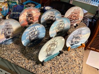 Set of eight complete golden age clipper ship plates . $120