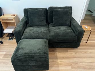 Two seater sofa w/ ottoman great condition