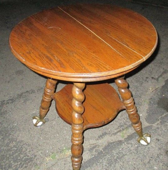 Solid oak end table with crystal claw feet