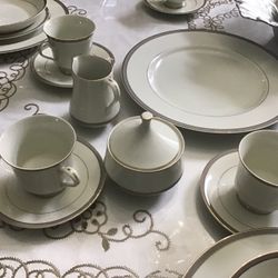 Beautiful dining set for eight only missing one cup