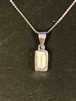 Emerald cut diamond white gold charm and chain